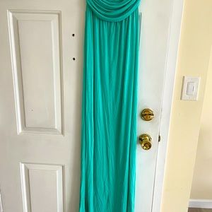 Turquoise beach dress. Soft and stretchy material. Size S. Very good condition.